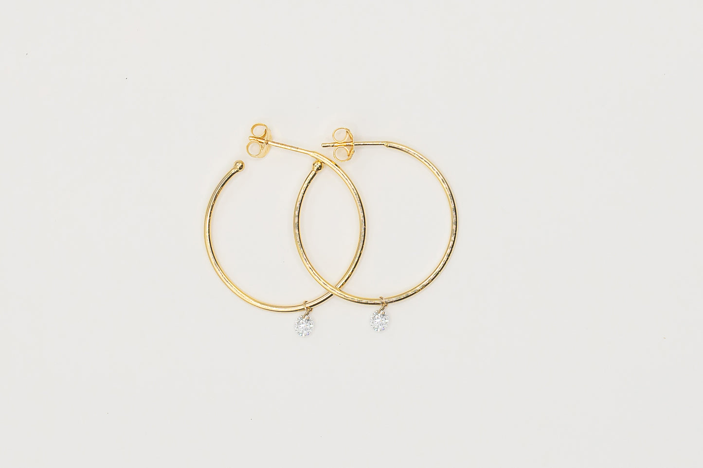 Single Floating Diamond Hoops